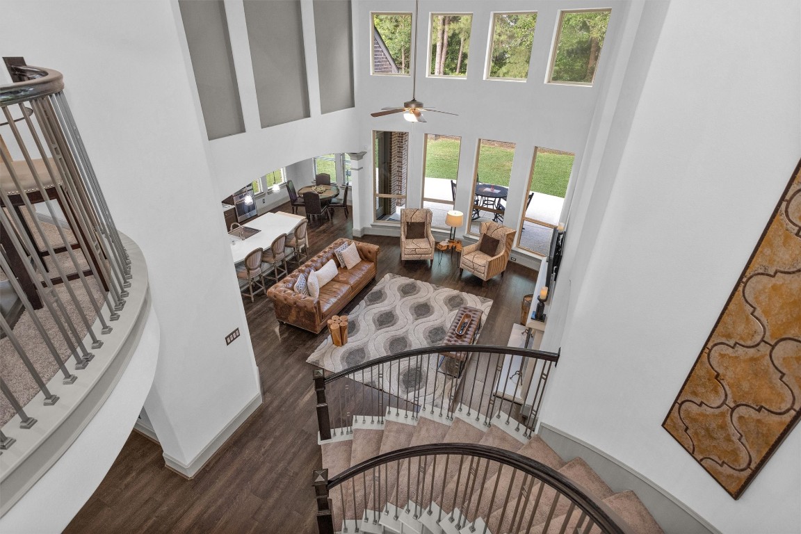 106 Cliftons Curve Way Montgomery, TX 77316 - Photo 29 of 47 Stylish spiral staircase, a leads to exceptional living & entertaining space