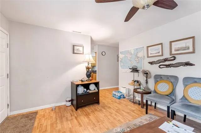 a room with furniture and wooden floor