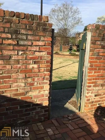 a garden view with a seating space