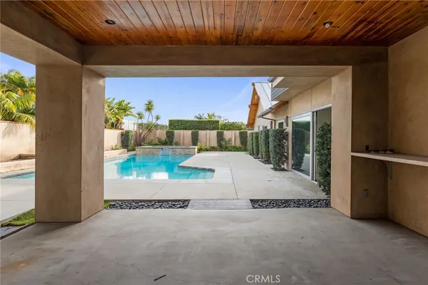 a backyard of a house with seating space