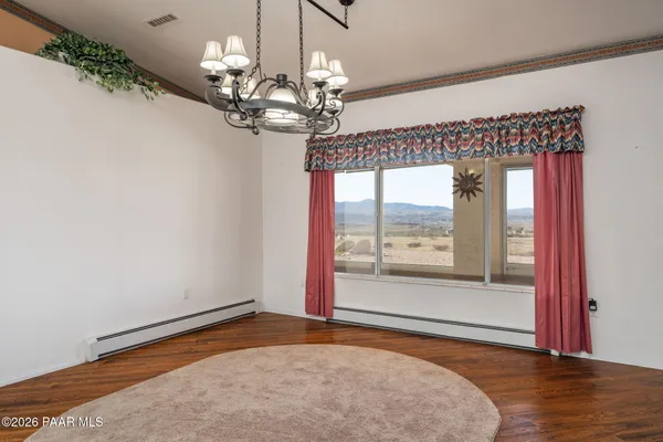 a front view of a house with parking space