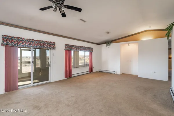 a view of a room with racks on the wall