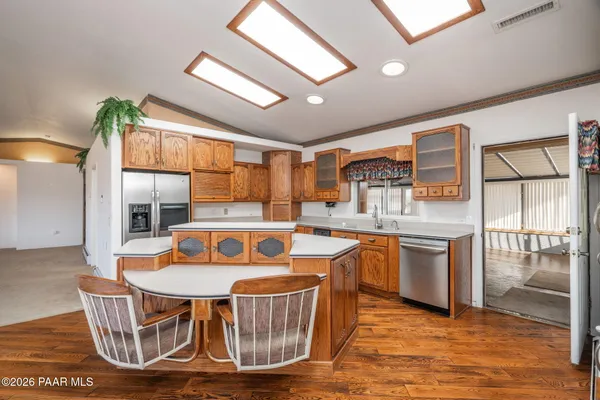 a view of an empty room with a large window