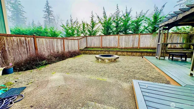 a view of swimming pool with patio