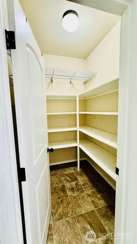 a room with storage and utility