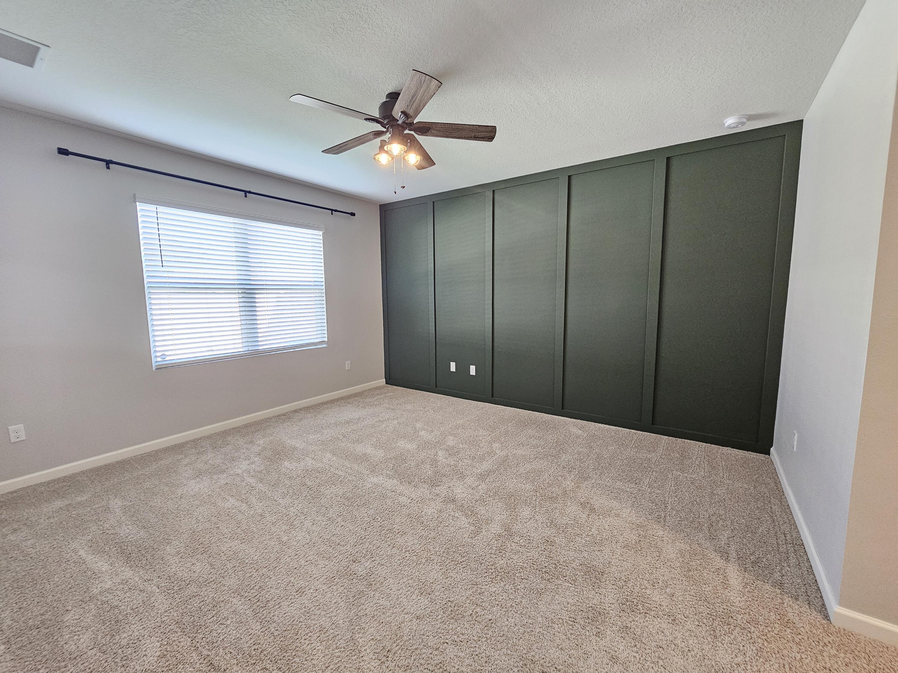 480 Sorrento Drive Cocoa, FL 32922 - Photo 14 of 24 a view of an empty room with a window