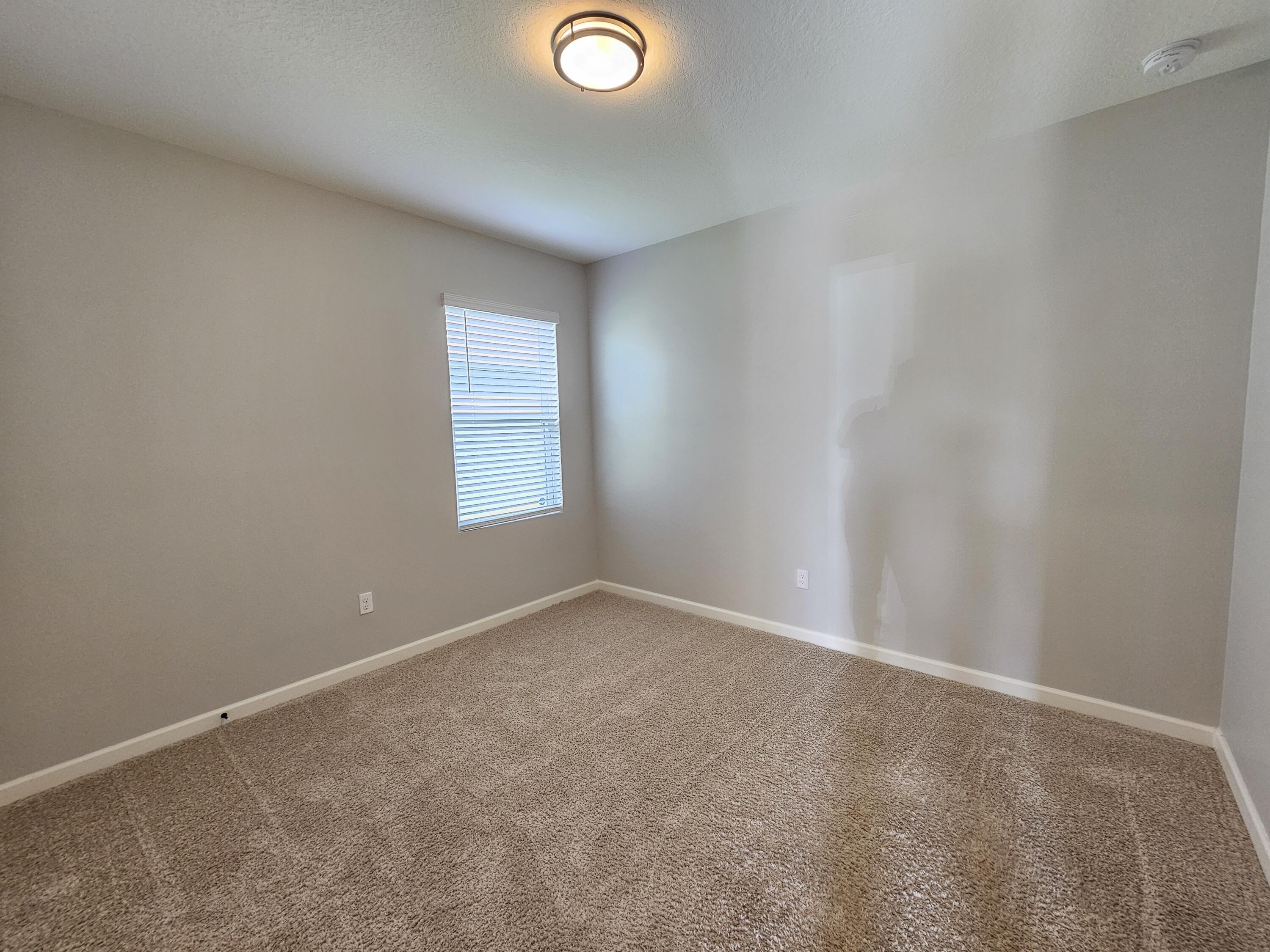 480 Sorrento Drive Cocoa, FL 32922 - Photo 19 of 24 an empty room with a window