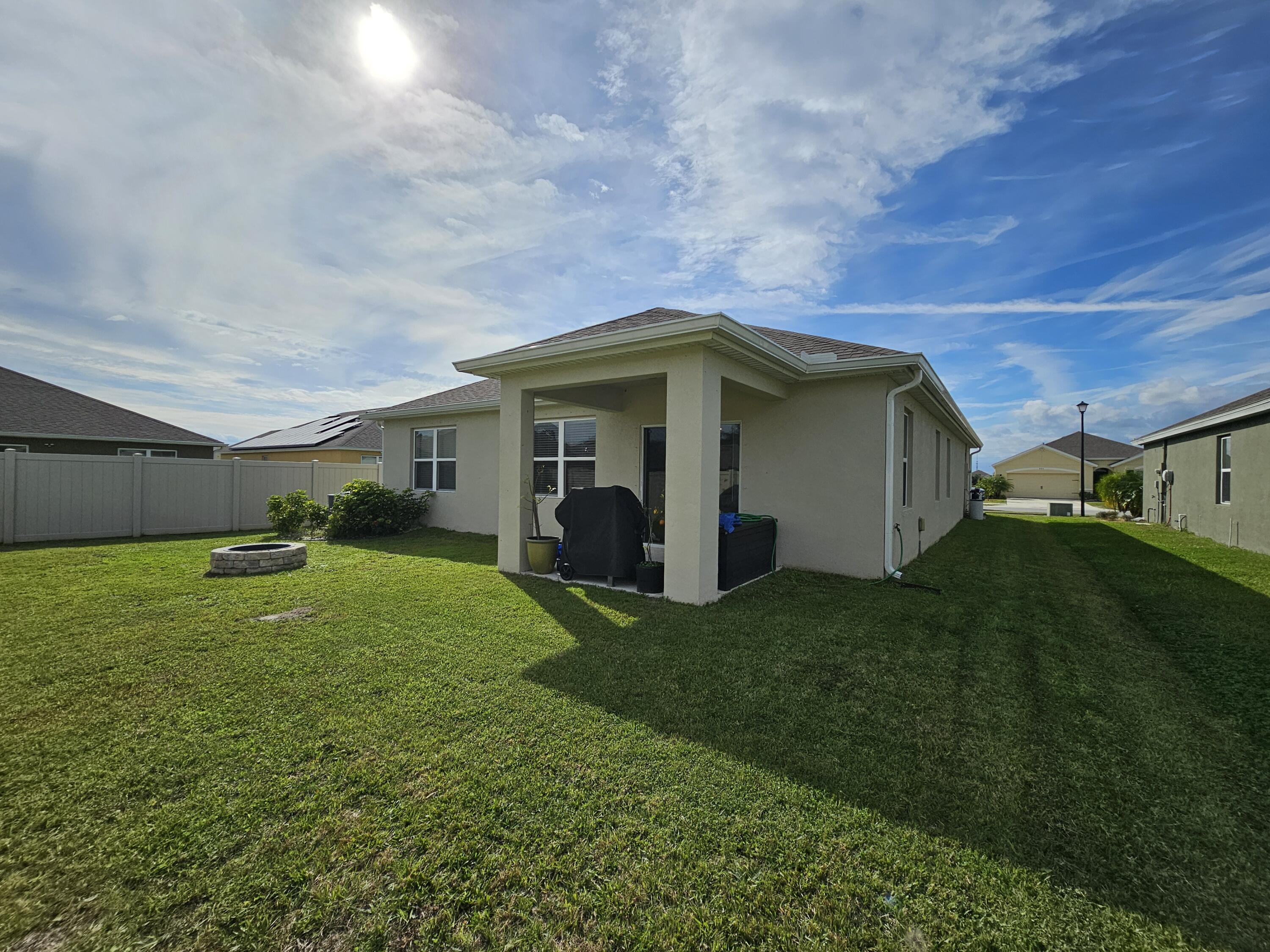 480 Sorrento Drive Cocoa, FL 32922 - Photo 22 of 24 a front view of house with yard and green space