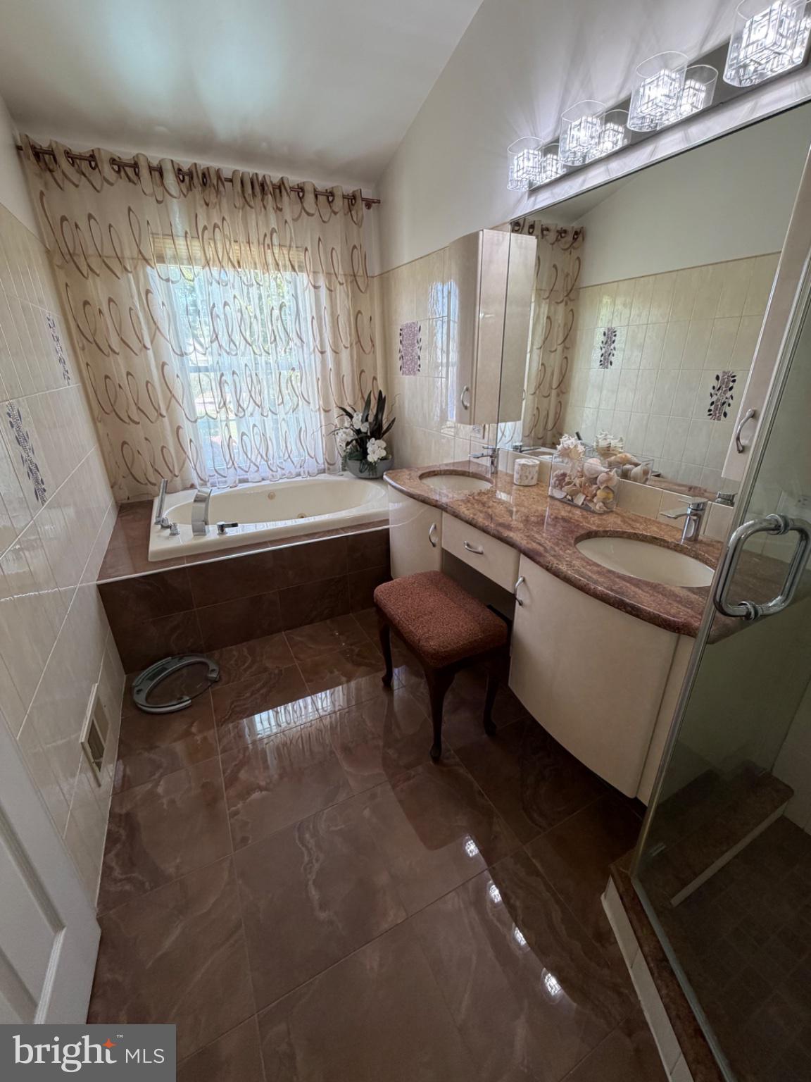 2703 Sterling Road Yardley, PA 19067 - Photo 29 of 41 Elegant bathroom with natural light.