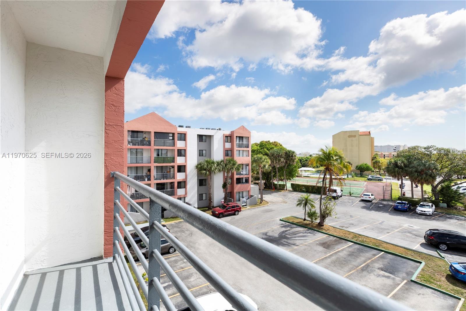 191 Northwest 97th Avenue, Unit 421 Miami, FL 33174 - Photo 11 of 15 a view of swimming pool from a balcony