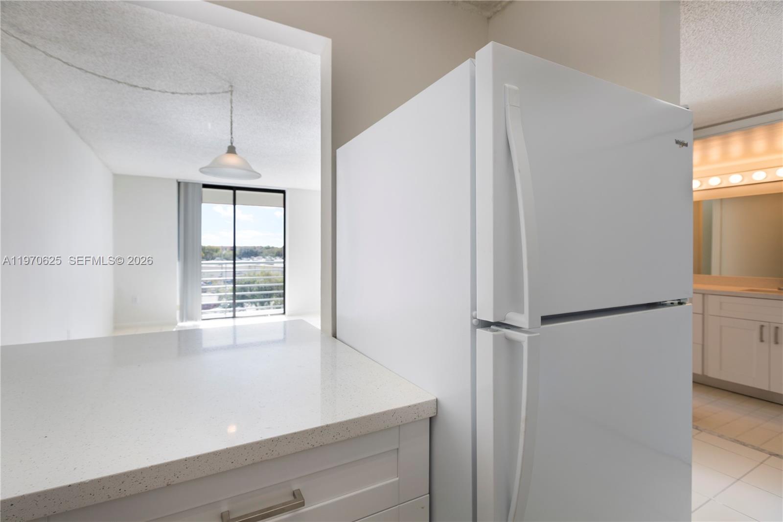 191 Northwest 97th Avenue, Unit 421 Miami, FL 33174 - Photo 2 of 15 a view of an empty room with a window