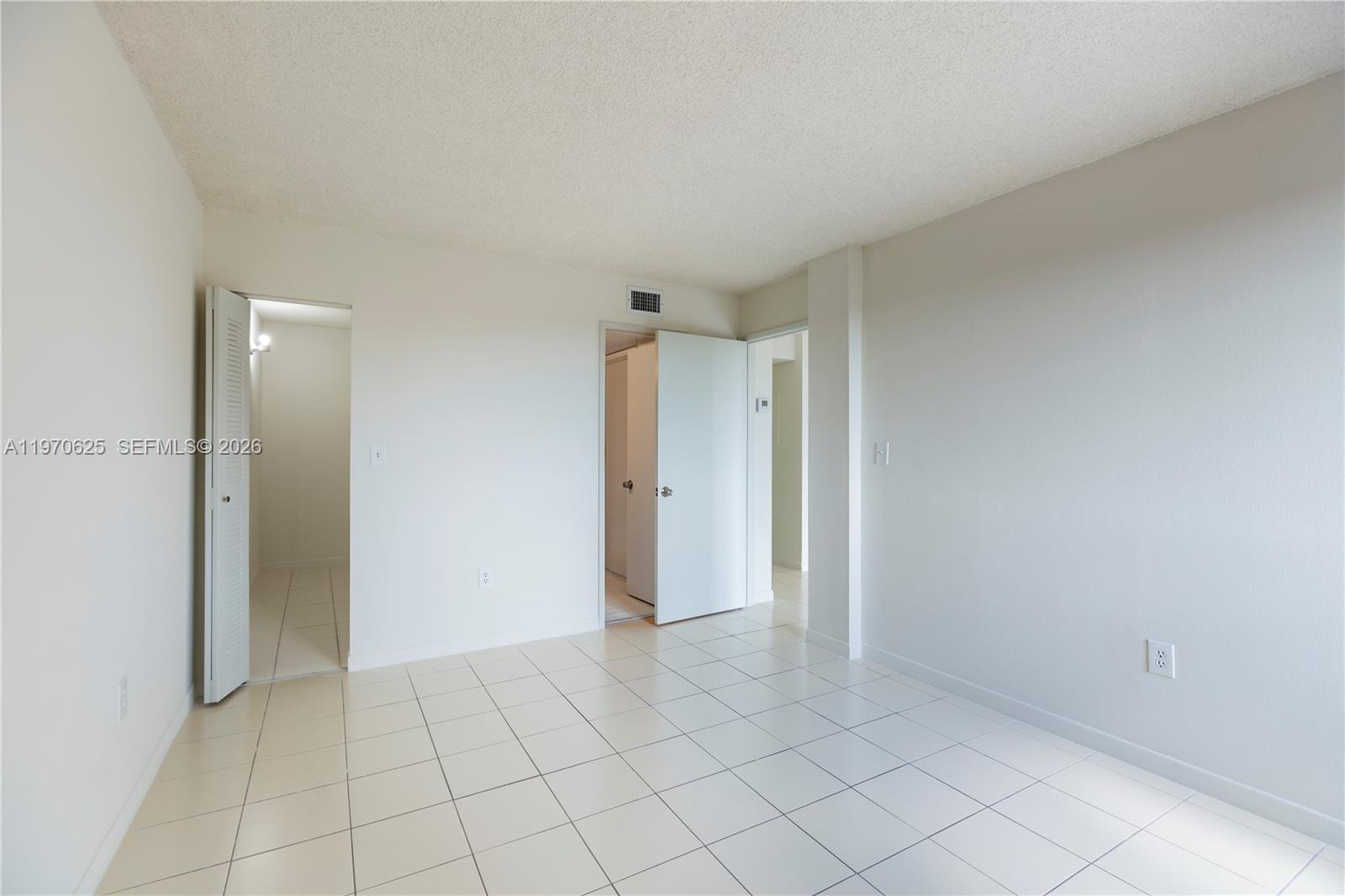 191 Northwest 97th Avenue, Unit 421 Miami, FL 33174 - Photo 8 of 15 a view of an empty room