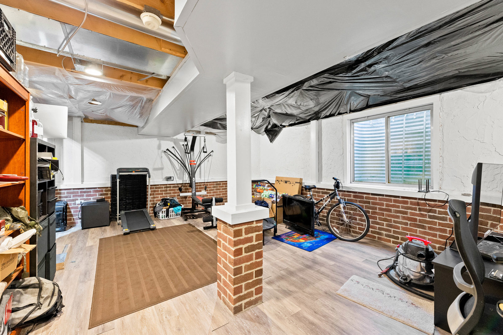 505 Frieh Drive Romeoville, IL 60446 - Photo 16 of 23 a bedroom with furniture and a fireplace