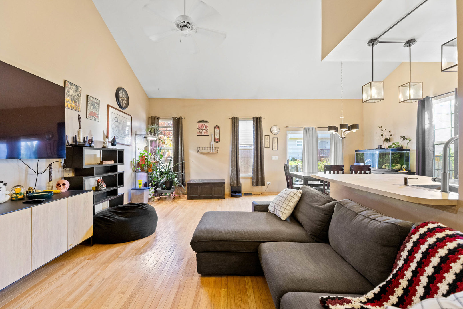 505 Frieh Drive Romeoville, IL 60446 - Photo 2 of 23 a living room with furniture fireplace and a large window