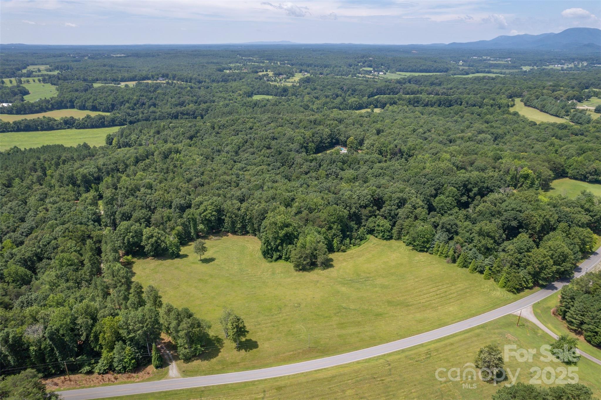 0 Jackson Grove Road Columbus, NC 28722 - Photo 24 of 28 a view of a big yard with green space