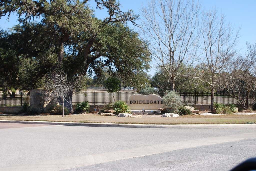 Tbd Lariat Trace Bandera, TX 78003 - Photo 5 of 6 a buildings with trees in front of it