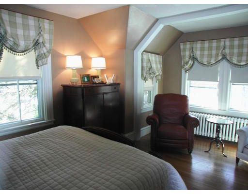 157 Weston Road Wellesley, MA 02482 - Photo 6 of 6 a bedroom with a bed chair and window