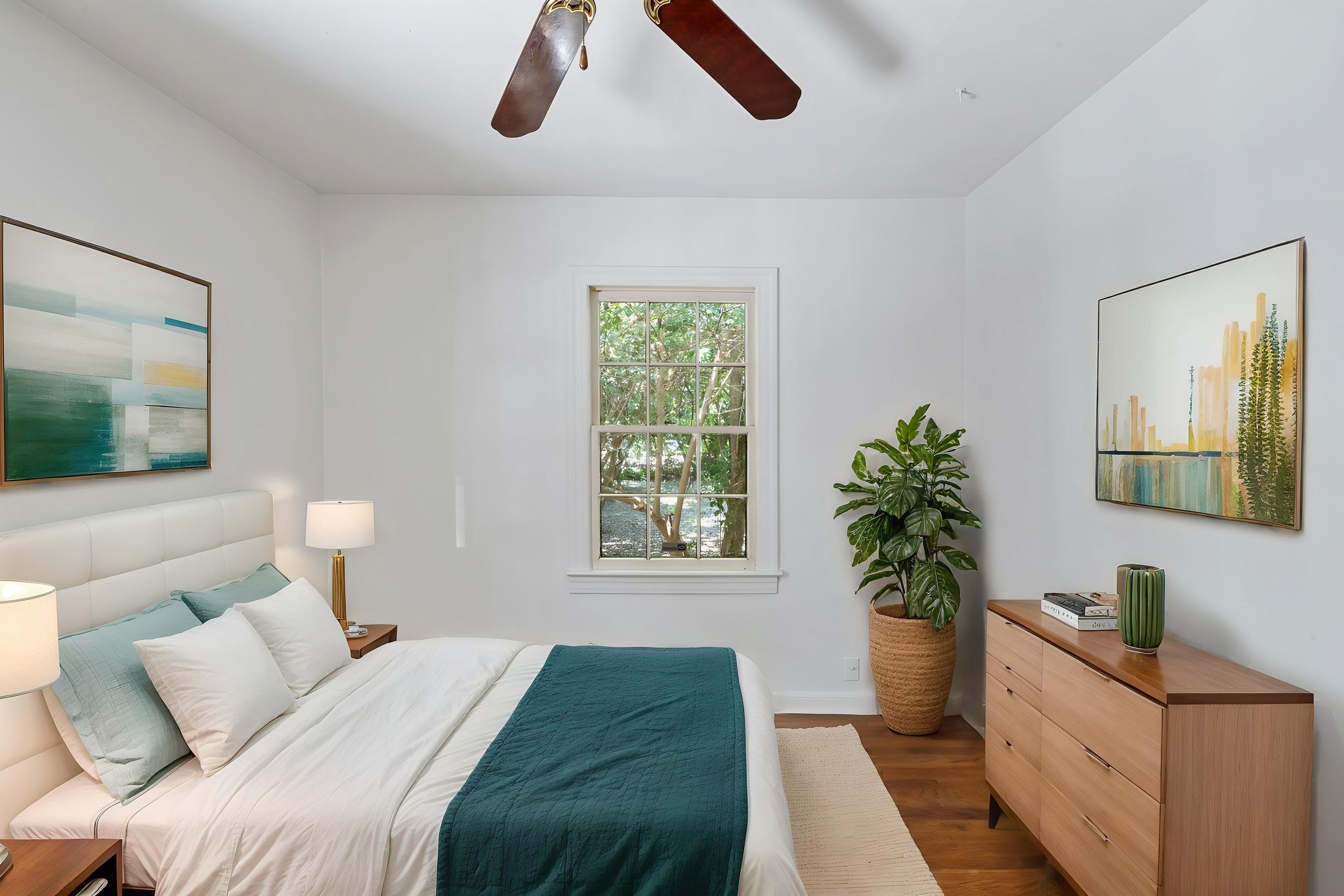 3704 Cherrywood Road Austin, TX 78722 - Photo 19 of 40 Back bedroom staged with lots of natural light.