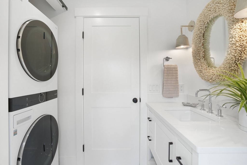 37 Rd To The Plaines Edgartown, MA 02539 - Photo 20 of 42 a bathroom with a sink and a mirror