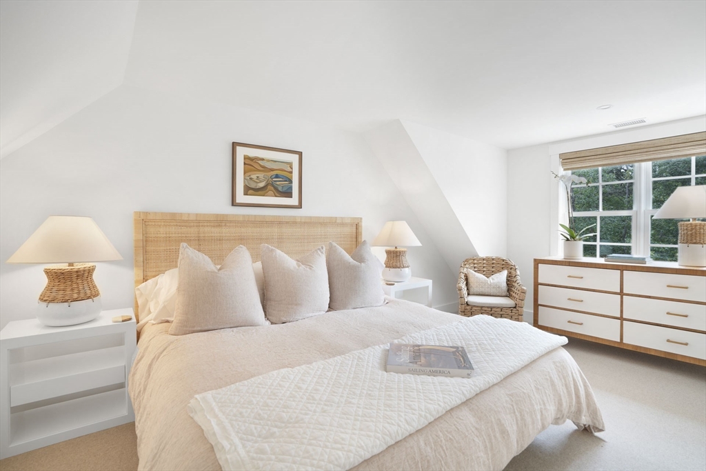 37 Rd To The Plaines Edgartown, MA 02539 - Photo 29 of 42 a bedroom with a bed and a large window