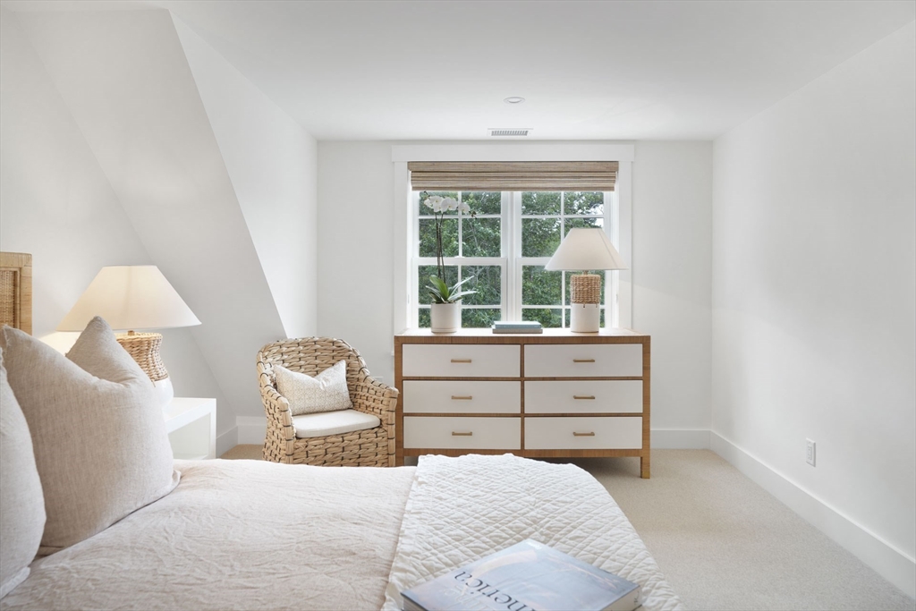 37 Rd To The Plaines Edgartown, MA 02539 - Photo 30 of 42 a bedroom with a bed and a window