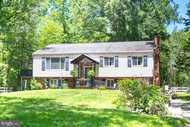 29 Friendship Road Southampton, NJ 08088 - Photo 1 of 28 Charming home nestled in lush greenery.