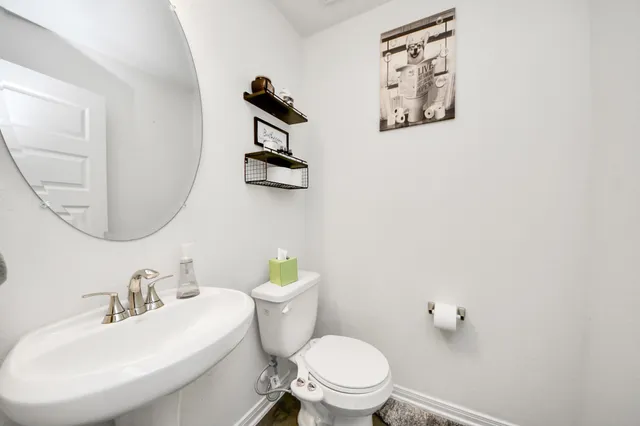 a view of a hallway with staircase