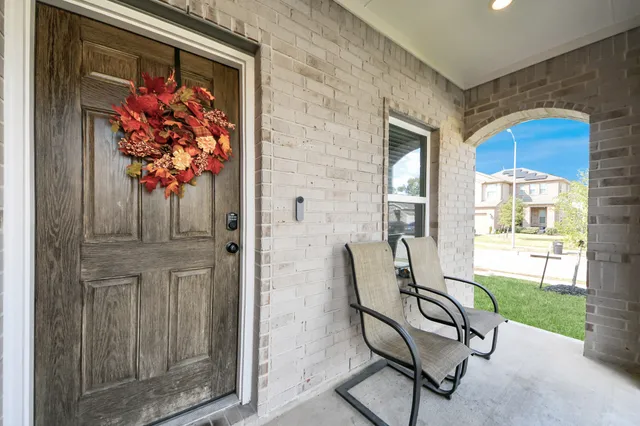 a view of a entryway with a livingroom
