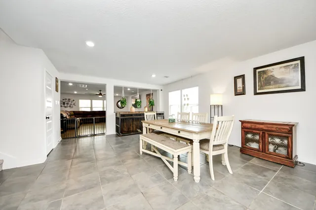 a view of a livingroom with furniture and a fireplace