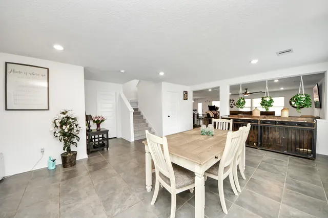 a dining room with furniture and a livingroom