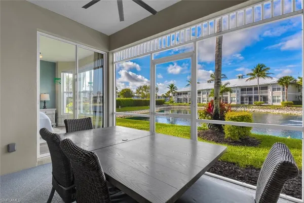 a view of a swimming pool with a patio