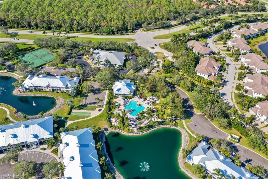 7880 Mahogany Run Lane, Unit 1614 Naples, FL 34113 - Photo 29 of 38 an aerial view of a residential houses with outdoor space and swimming pool