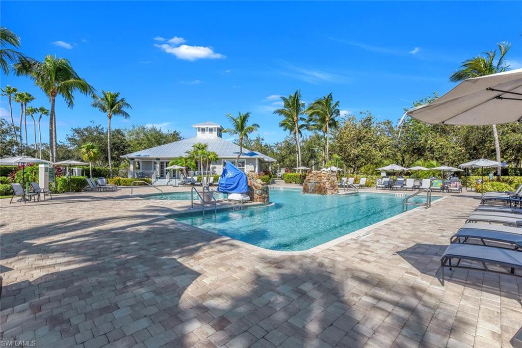 7880 Mahogany Run Lane, Unit 1614 Naples, FL 34113 - Photo 34 of 38 a view of a park with swings and slides