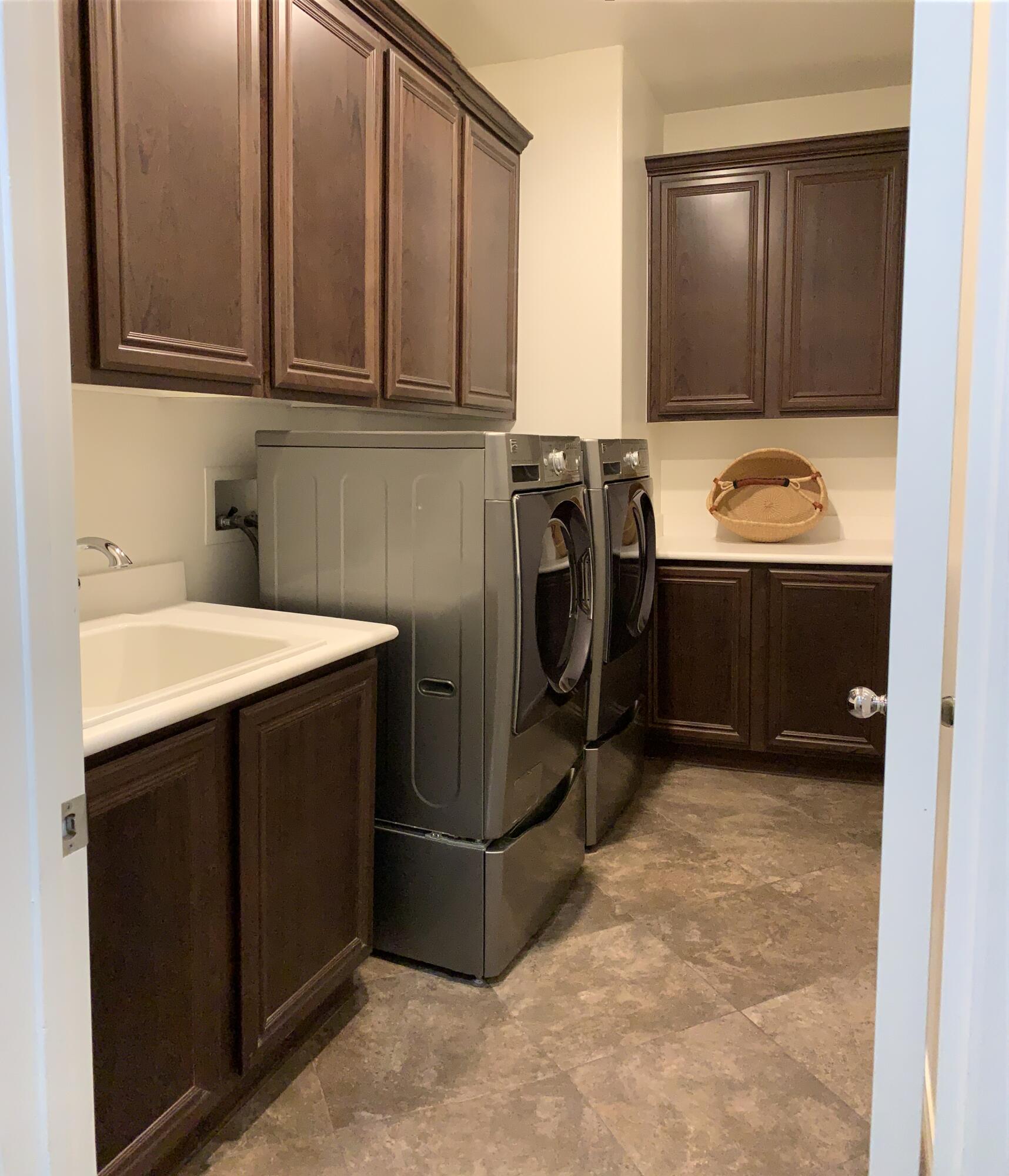 82515 Grass Flat Lane Indio, CA 92203 - Photo 25 of 44 a utility room with dryer and washer