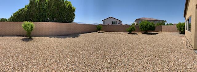 82515 Grass Flat Lane Indio, CA 92203 - Photo 28 of 44 a view of a wooden street with potted plants
