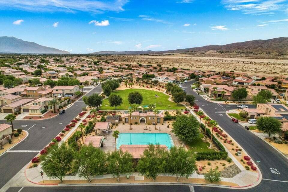 82515 Grass Flat Lane Indio, CA 92203 - Photo 31 of 44 an aerial view of residential houses with outdoor space