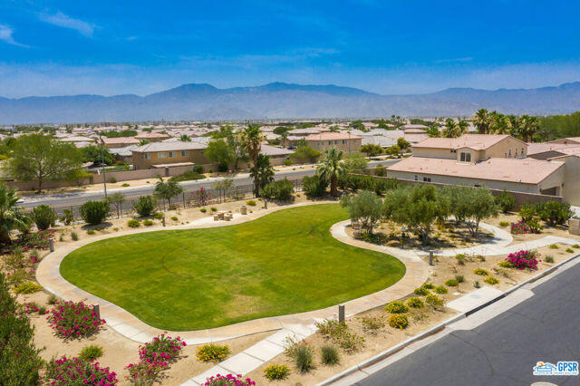 82515 Grass Flat Lane Indio, CA 92203 - Photo 33 of 44 a view of a swimming pool with an ocean view