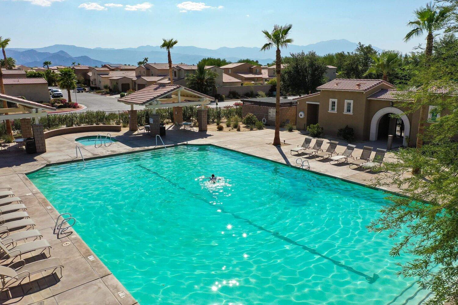 82515 Grass Flat Lane Indio, CA 92203 - Photo 35 of 44 a front view of a house with garden