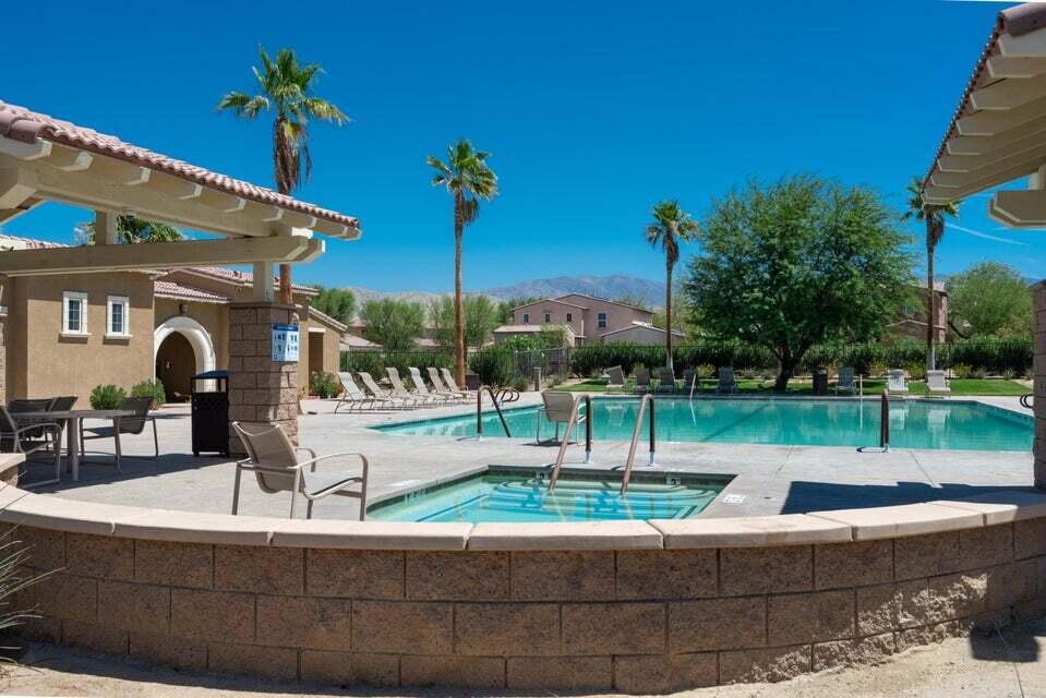 82515 Grass Flat Lane Indio, CA 92203 - Photo 36 of 44 a view of a house with a swimming pool