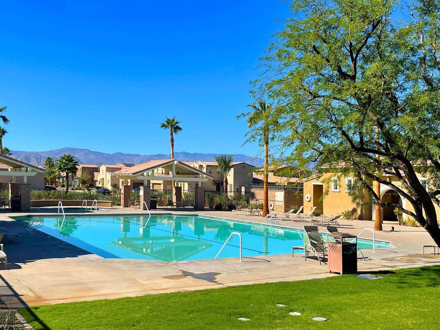 82515 Grass Flat Lane Indio, CA 92203 - Photo 37 of 44 a view of a house with a yard