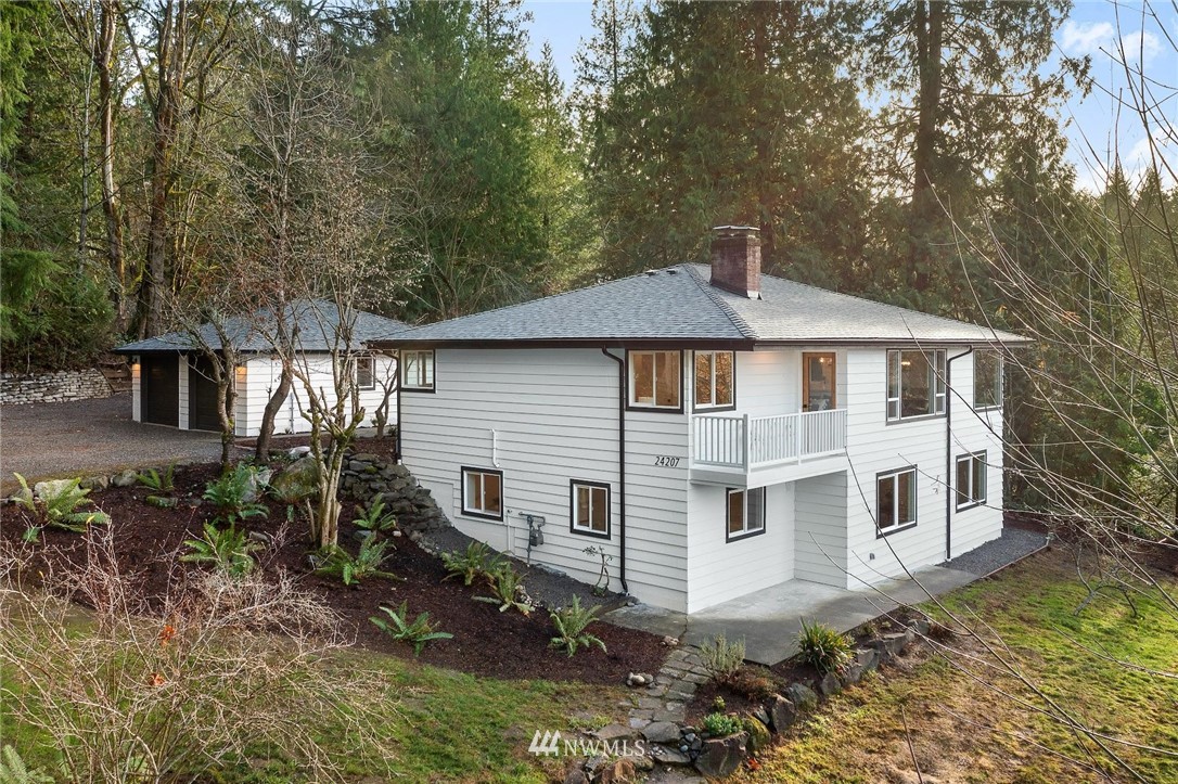 24207 39th Avenue Southeast Bothell, WA 98021 - Photo 1 of 39 a view of a house with a yard