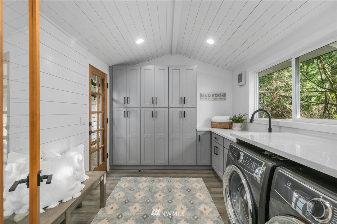 24207 39th Avenue Southeast Bothell, WA 98021 - Photo 17 of 39 a utility room with cabinets