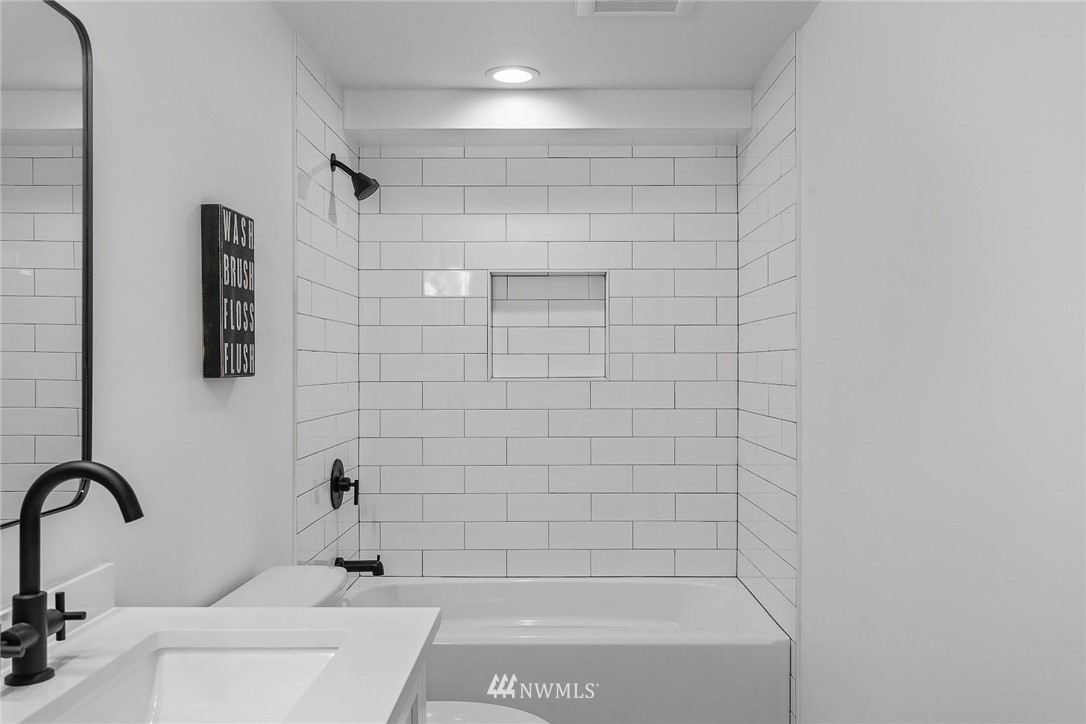 24207 39th Avenue Southeast Bothell, WA 98021 - Photo 25 of 39 a bathroom with a shower and a sink