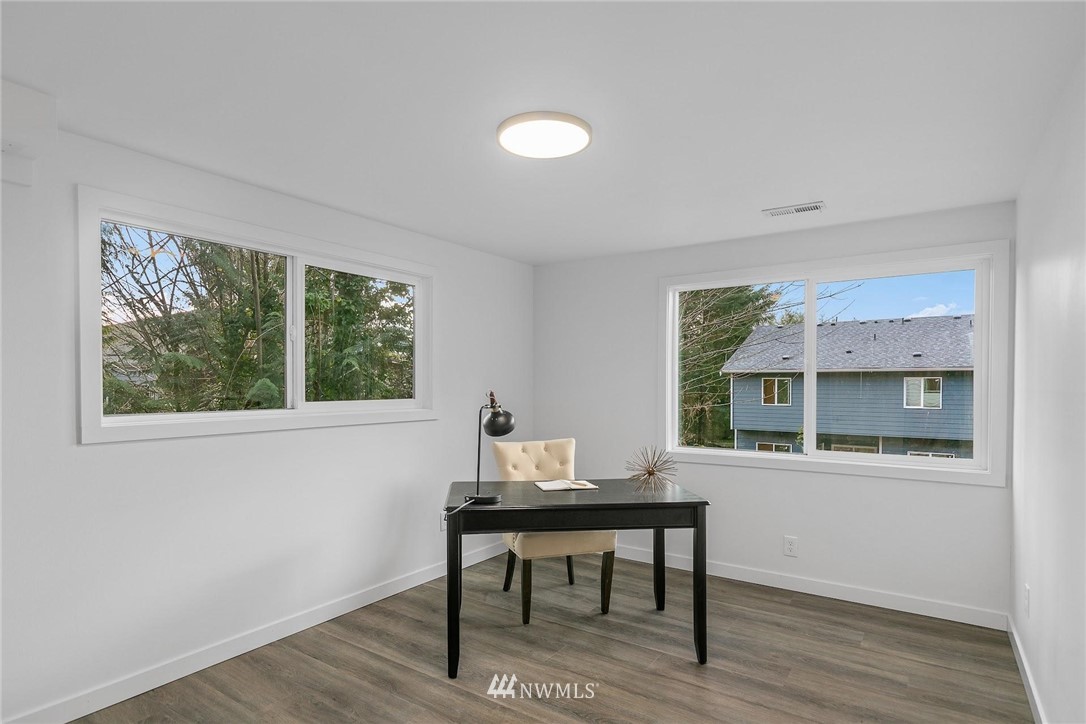 24207 39th Avenue Southeast Bothell, WA 98021 - Photo 26 of 39 a workspace with furniture and a window