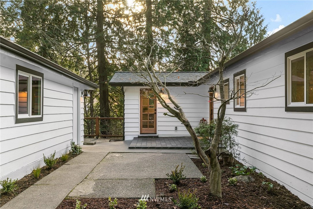 24207 39th Avenue Southeast Bothell, WA 98021 - Photo 4 of 39 a house that has a tree in front of the house