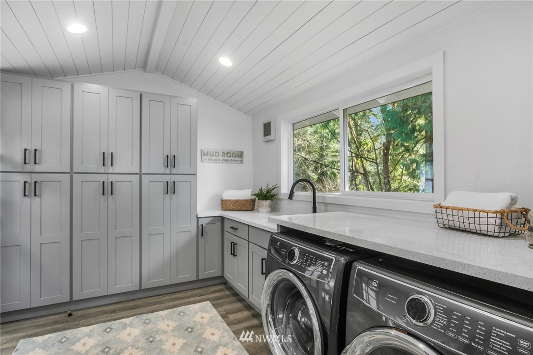24207 39th Avenue Southeast Bothell, WA 98021 - Photo 31 of 39 a utility room with cabinets