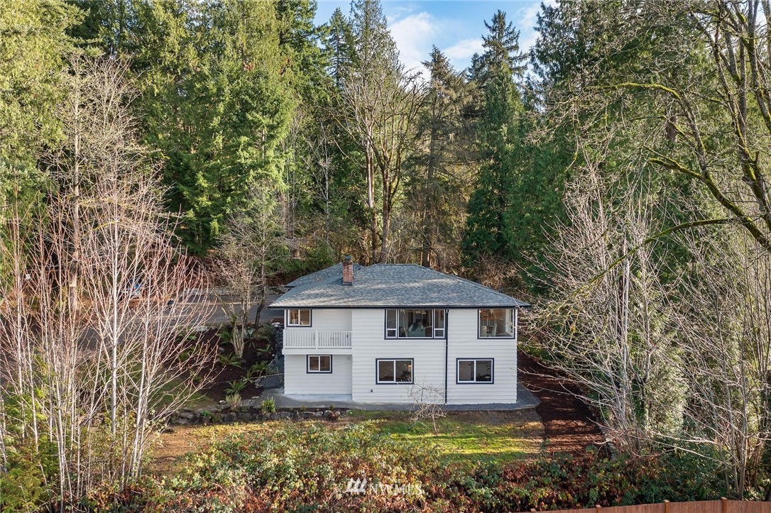 24207 39th Avenue Southeast Bothell, WA 98021 - Photo 36 of 39 a view of a house with a big yard and large trees