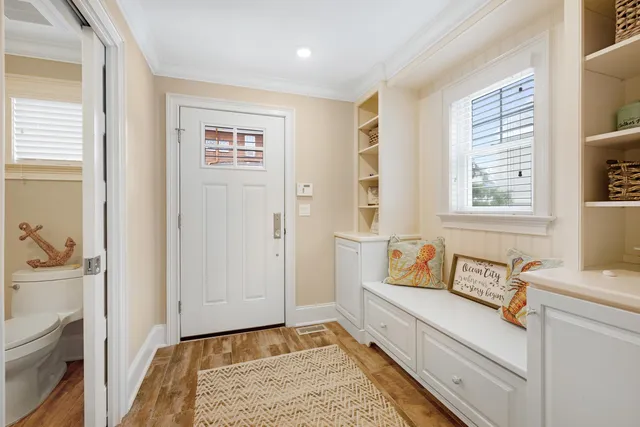 a spacious bedroom with a bed and a couch