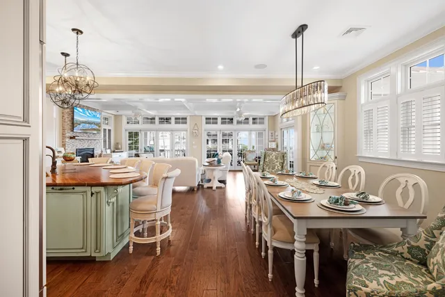 a very nice looking dining room with a table and chairs