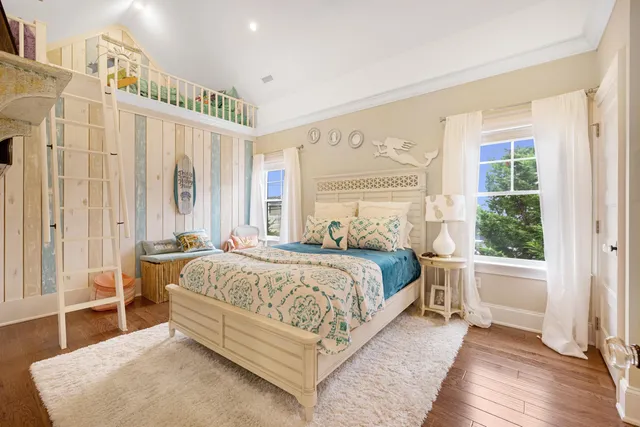 a bedroom with a large bed and a window